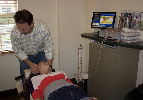 Patient receiving neck therapy